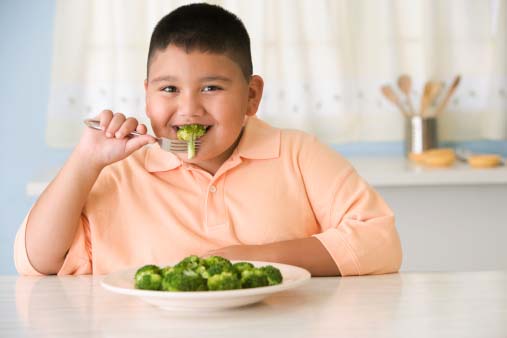 fat kid eating fruits=